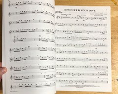 Ultimate Pop & Rock Instrumental Solos Alto Saxophone Level 2-3 Sheet Music Disc