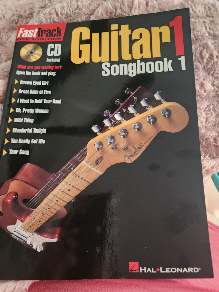 (1997) Hal Leonard Guitar 1 with CD Included. Fast Track Music Instruction Book