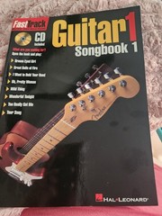 (1997) Hal Leonard Guitar 1 with CD Included. Fast Track Music Instruction Book