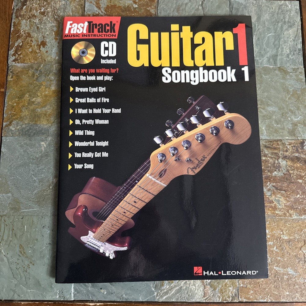 (1997) Hal Leonard Guitar 1 with CD Included. Fast Track Music Instruction Book