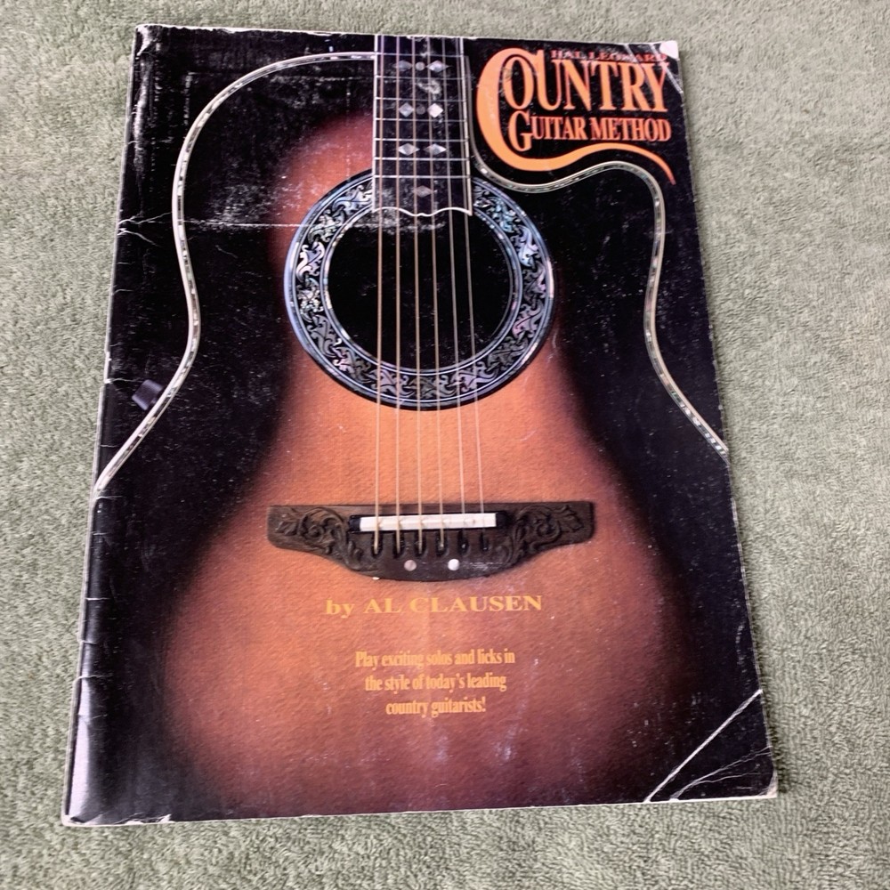 Hal Leonard Country Guitar Method Instruction Book. 1985. 47 pages.